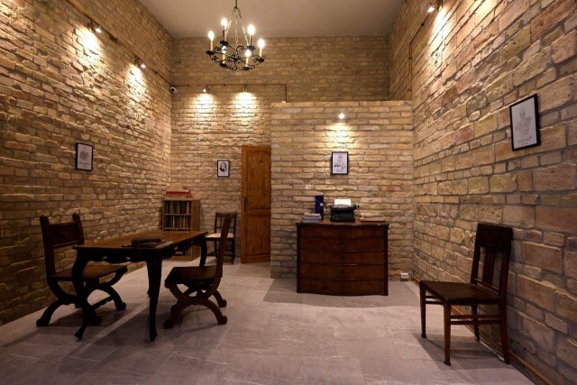 High-Ceiling Brick Gallery | Boutique Bohemian Interior